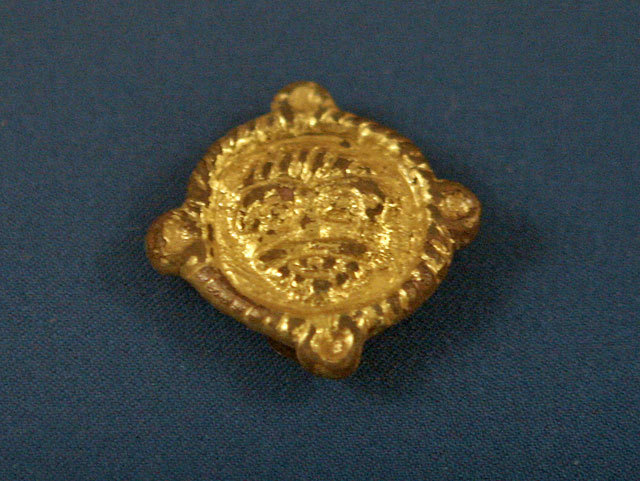 Bronze gilded fitting with face